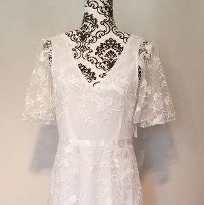 Beautiful White Lace Dress. V-shaped back.